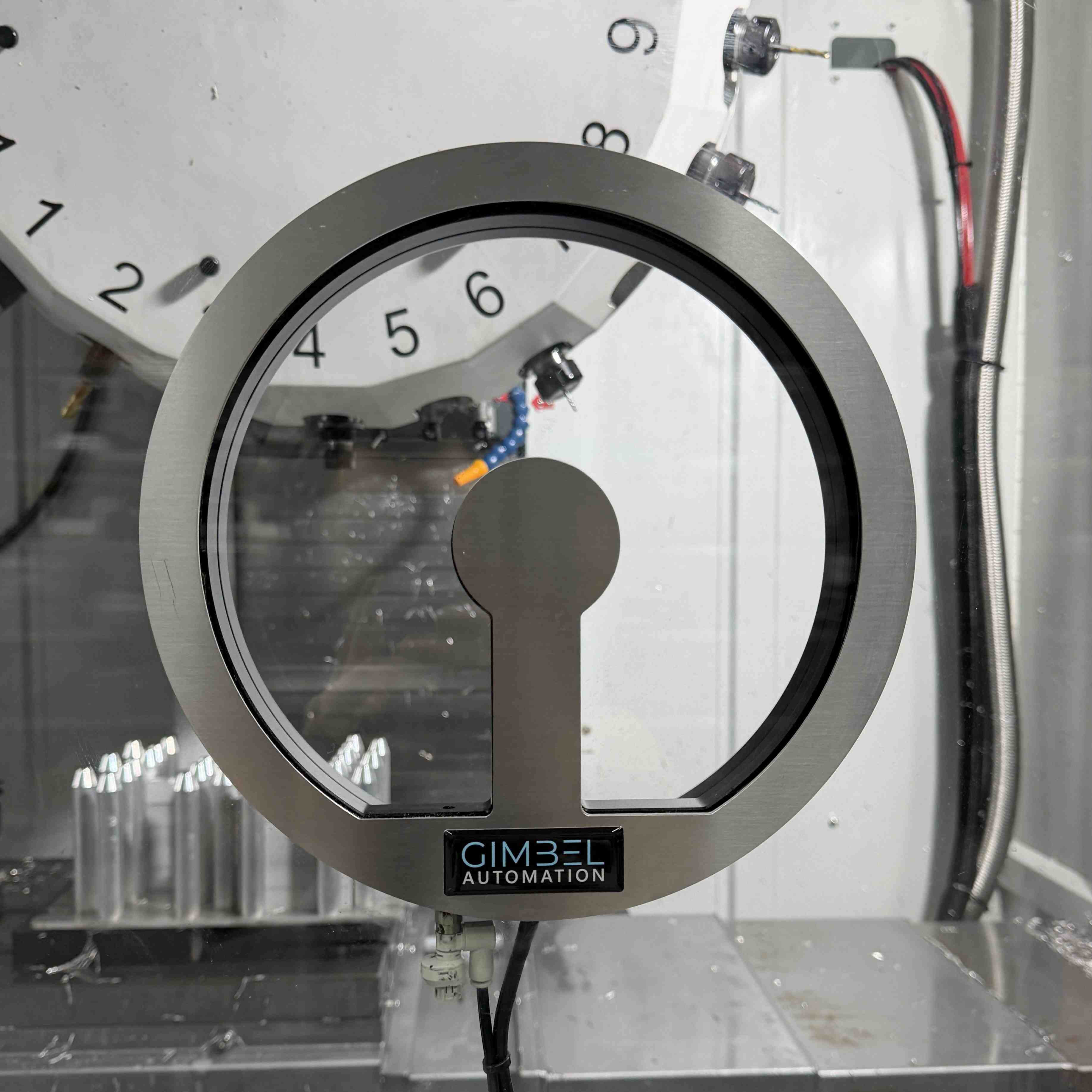 CoolantClear rotary spinning window for CNC machines by Gimbel Automation